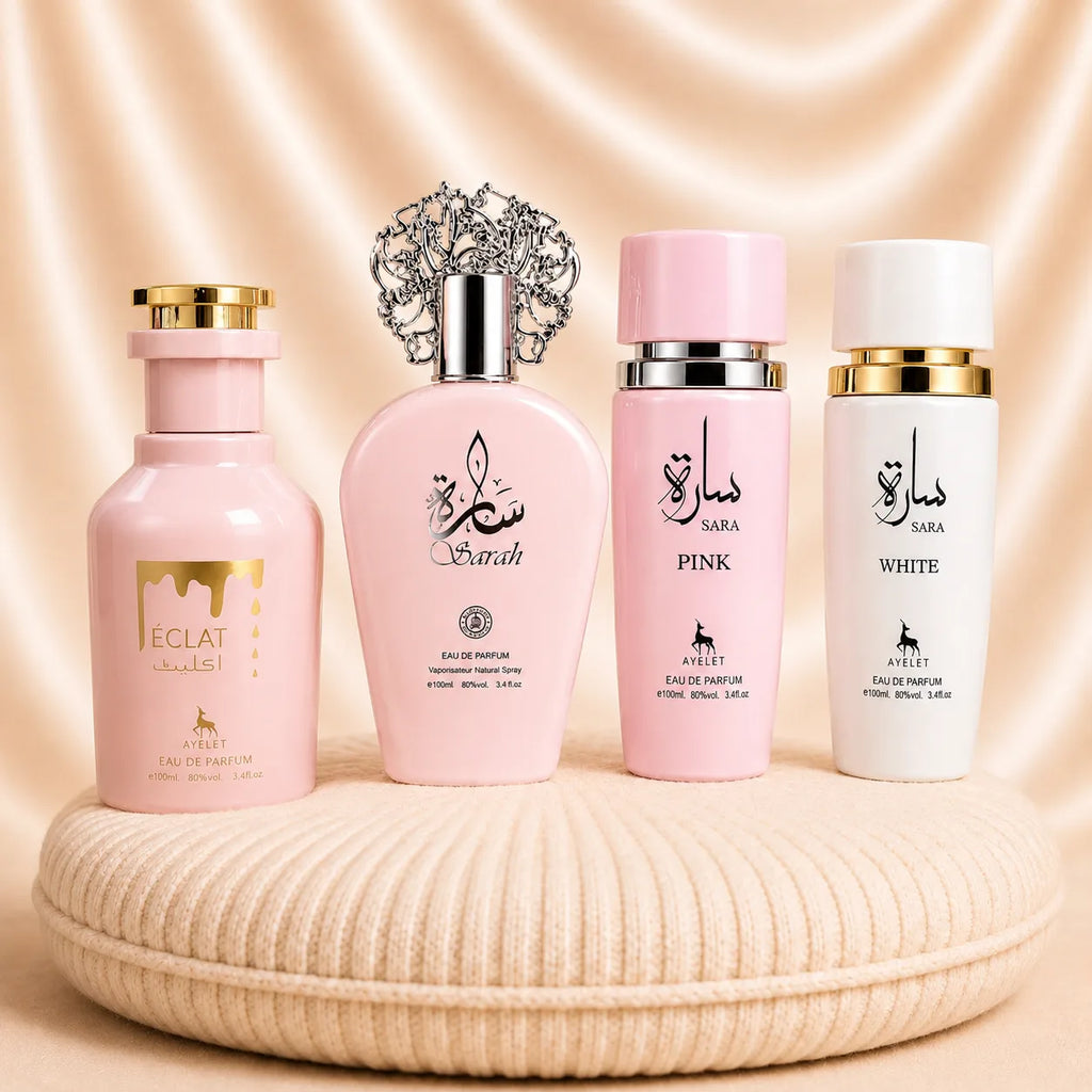 Set of four ZEIRA oriental women's perfumes including Sara Pink, Sarah, Eclat, and Sara White bottles with elegant packaging.