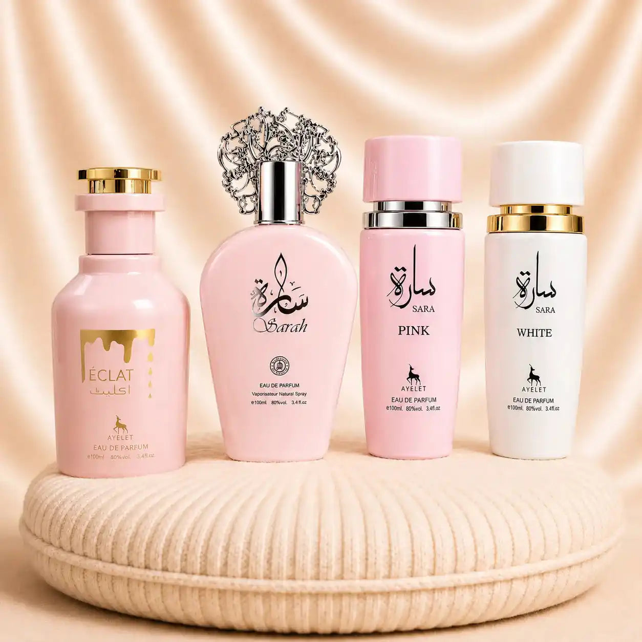 Set of four ZEIRA oriental women's perfumes including Sara Pink, Sarah, Eclat, and Sara White bottles with elegant packaging.