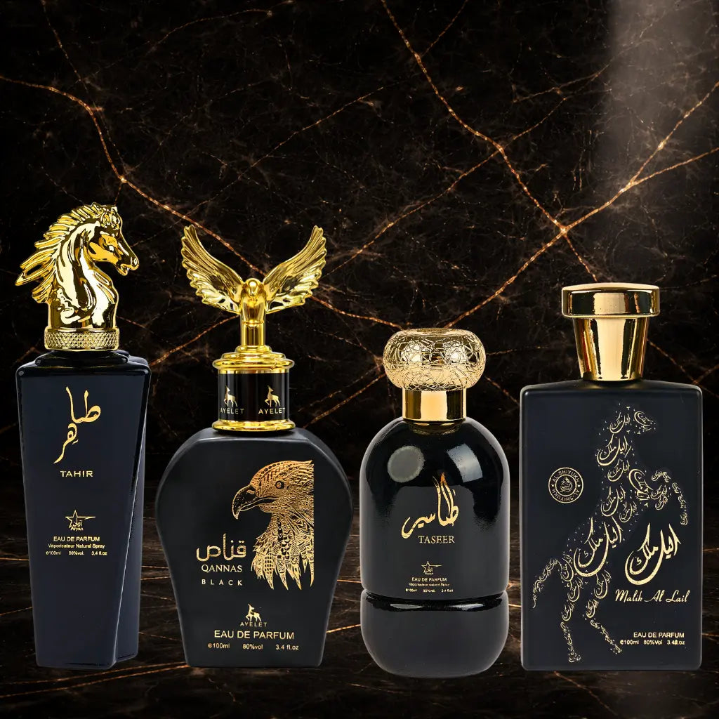 Set of four men's oriental perfumes by ZEIRA including Tahir, Qannas Black, Taseer, and Malik Al Lail, displayed in bottles.