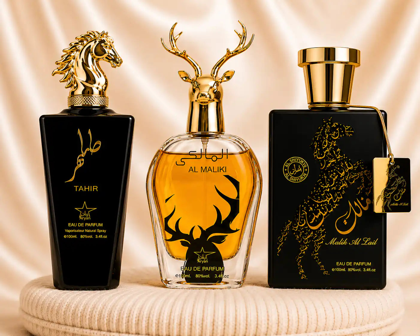 Set of three oriental men's perfumes by ZEIRA, featuring Tahir, Al Maliki, and Qannas Black in elegant bottles.