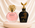 Set of two oriental perfumes by Zeira, featuring Dama and Barbat scents, with Qannas Black and Antarctic Pink bottles.