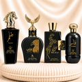 Set of four oriental men's perfumes including Tahir, Qannas Black, Taseer, and Malik Al Lail by ZEIRA, displayed in bottles.