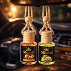 Set of two ZEIRA auto odorizer sprays with peach and melon scents, designed to freshen car interiors with natural fragrances.