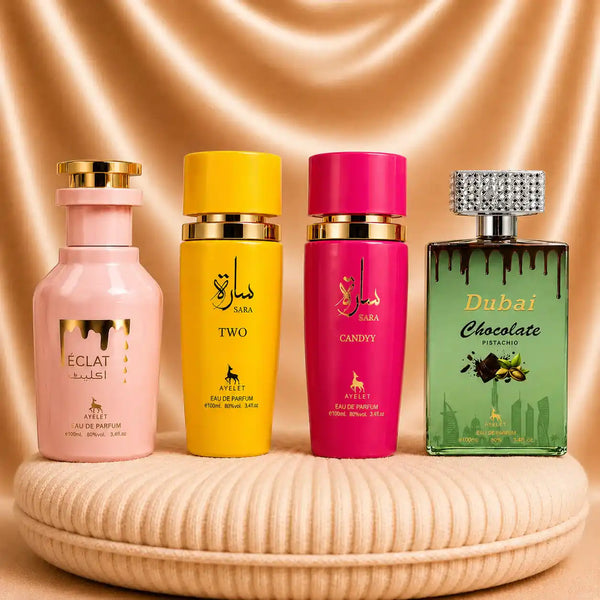 Set of four ZEIRA oriental perfumes including Eclat, Sara Two, Sara Candy, and Dubai Chocolate Pistachio, featuring elegant bottles.