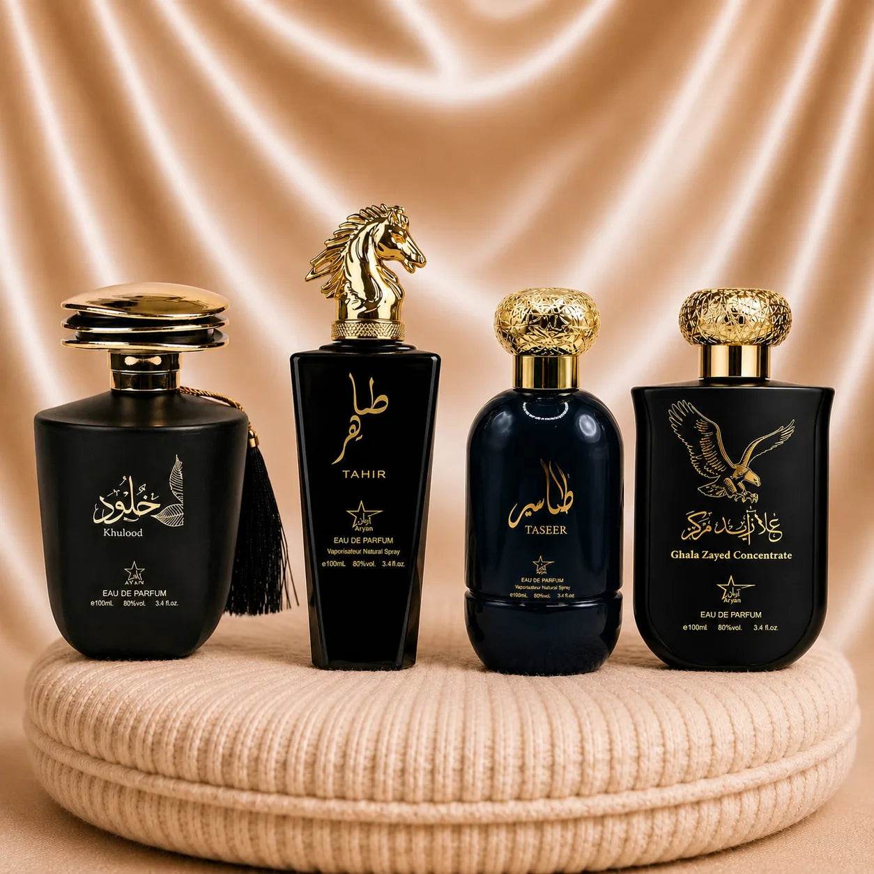 Set of four oriental men's perfumes by ZEIRA including Tahir, Taseer, Khulood, and Ghala Zayed concentrate, displayed in bottles.