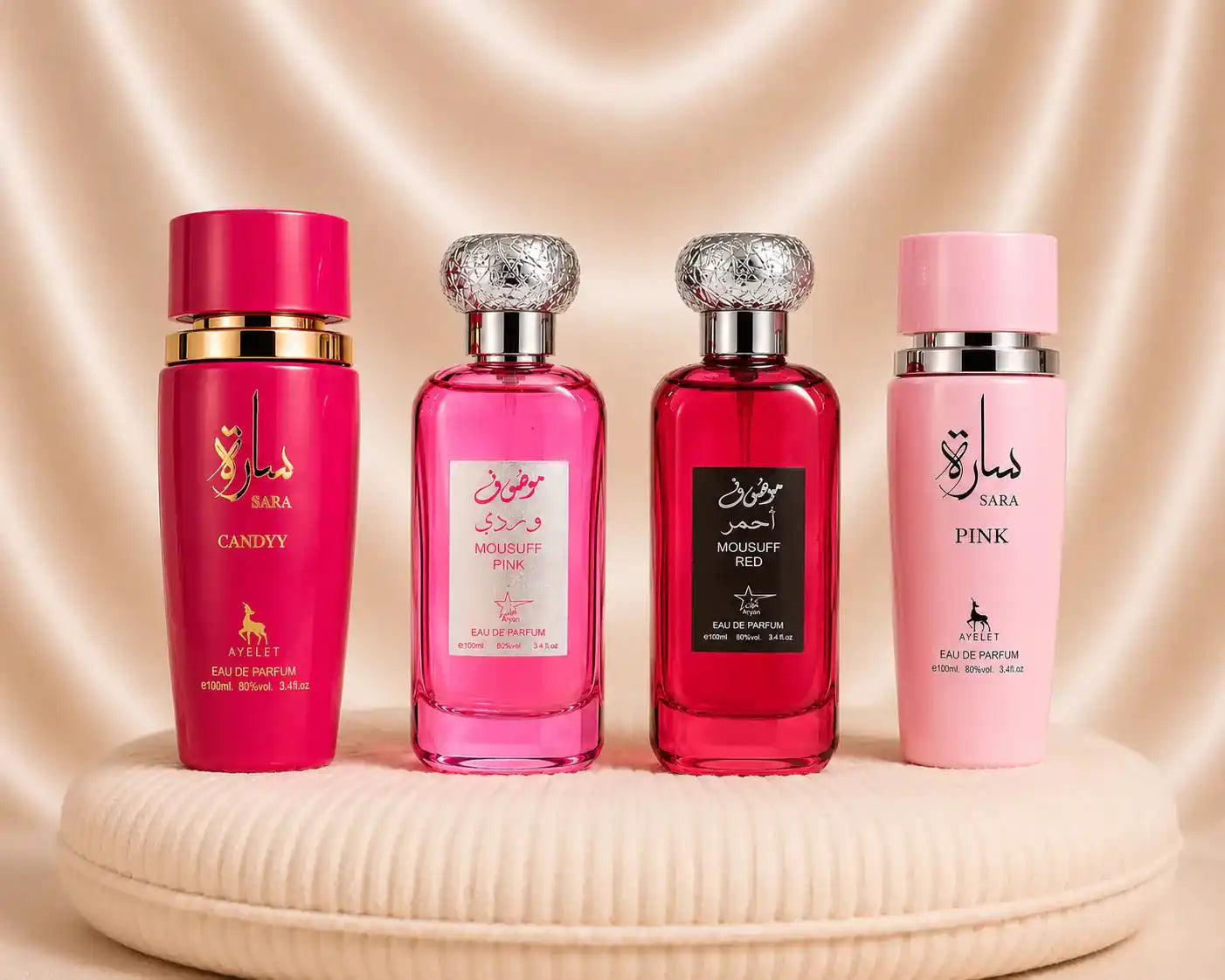 Set of four Zeira oriental perfumes for women featuring Sara Candy, Sara Pink, Mousuff Pink, and Mousuff Red bottles.