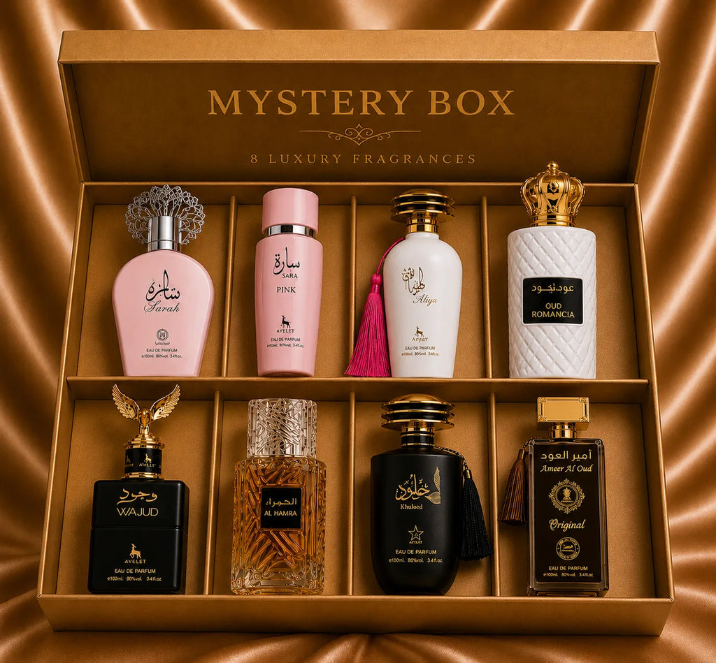 ZEIRA mystery box with 8 top Arabesti perfumes for women and men, featuring elegant bottles and a stylish presentation.