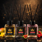Set of three ZEIRA ambient perfumes with mango, watermelon, and strawberry scents, displayed in elegant bottles.